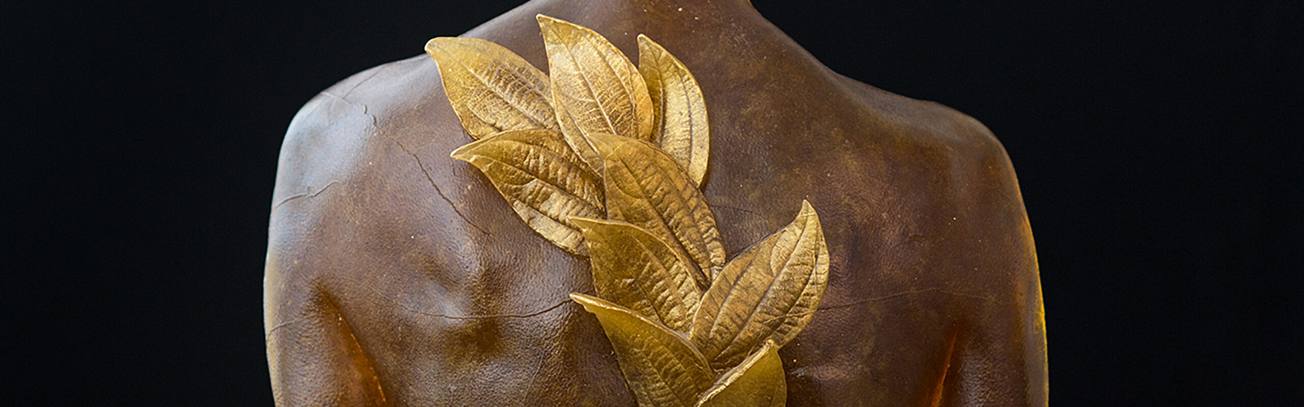Mary Van Cline (American, b. 1954), Torso with Gold Leaves, 2004, pâte de verre with gold leaf, 13 x 17 x 6 inches. Palmer Museum of Art, Gift of Bette and Arnold Hoffman, 2016.115. © Mary Van Cline