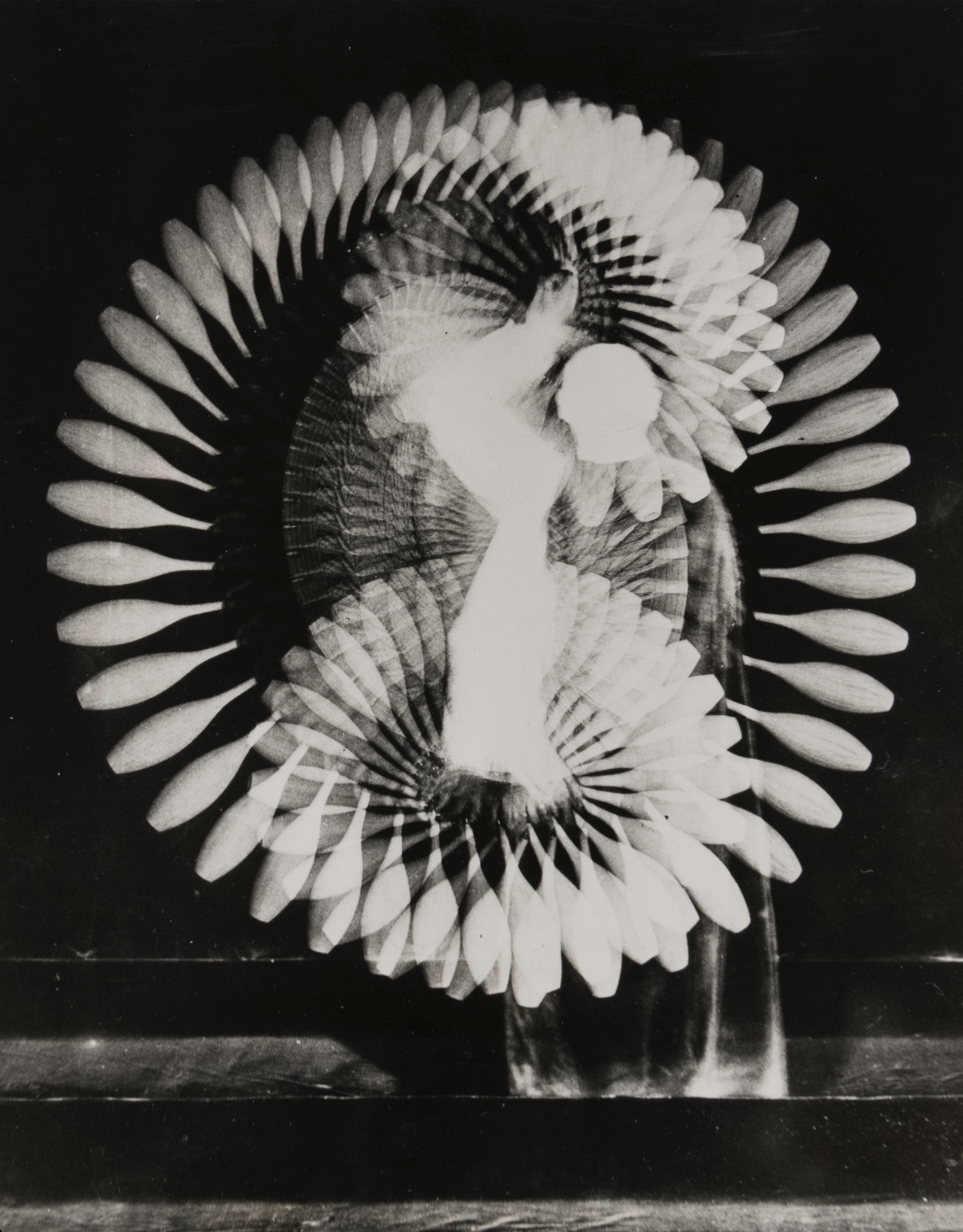 Black and white photo of a blurred object in motion